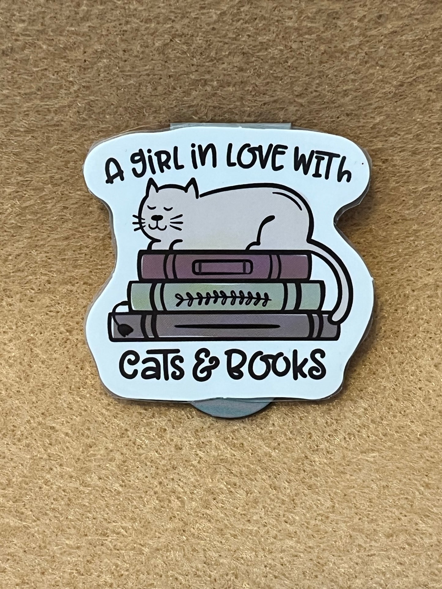 A girl in love with cats and books