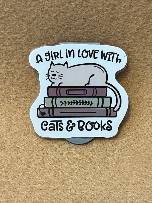 A girl in love with cats and books