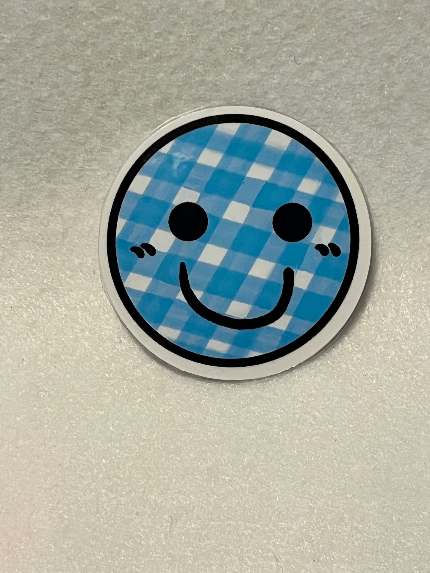 Blue check smiley